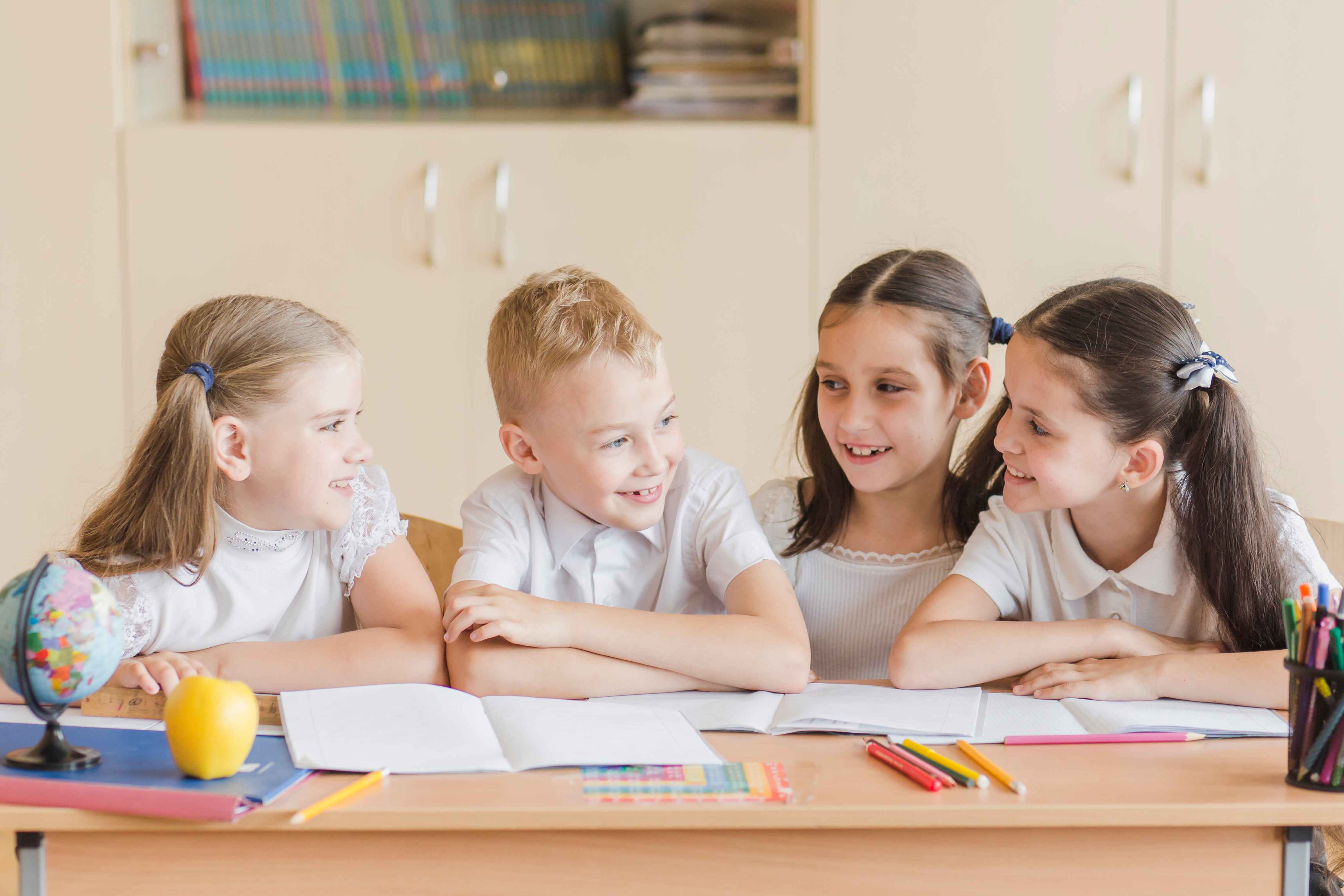 cheerful-kids-chatting-lesson