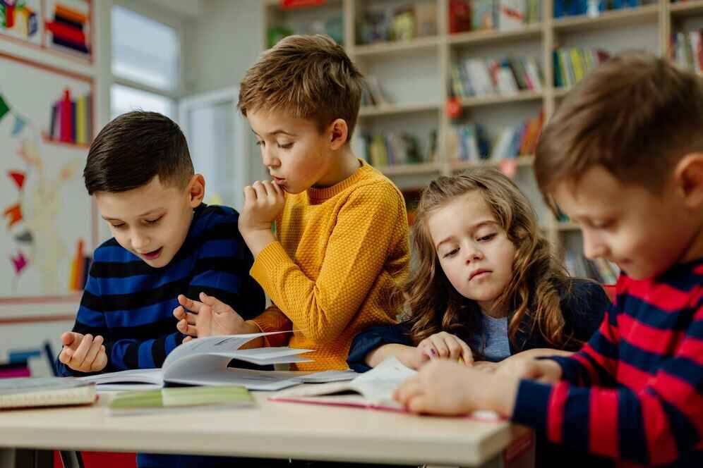 school-children-library-reading-books